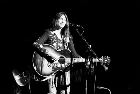 Emmylou Harris performing in concert with guitar 16x20 Poster 